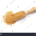 stock-photo-top-view-of-a-wooden-scoop-filled-with-organic-yellow-mustard-seeds-sinapis-alba-isolated-on-a-2484621669